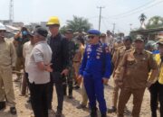 Kasat Polairud Polres Muba Bersama Bhabinkamtibmas Polsek Lalan dan Camat Lalan Dampingi Pj Bupati Muba dalam Kunker ke Desa Bandar Agung