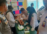 Kapolsek Tanjung Raja Hadiri dan Berikan Pengamanan Pada Acara Khitanan Massal di Kecamatan Sungai Pinang