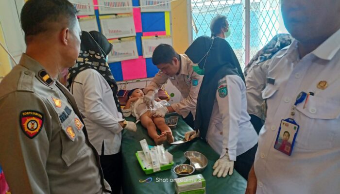 Kapolsek Tanjung Raja Hadiri dan Berikan Pengamanan Pada Acara Khitanan Massal di Kecamatan Sungai Pinang