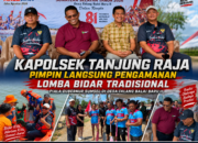 Kapolsek Tanjung Raja Pimpin Langsung Pengamanan Lomba Bidar Tradisional Piala Gubernur Sumsel di Desa Talang Balai Baru II
